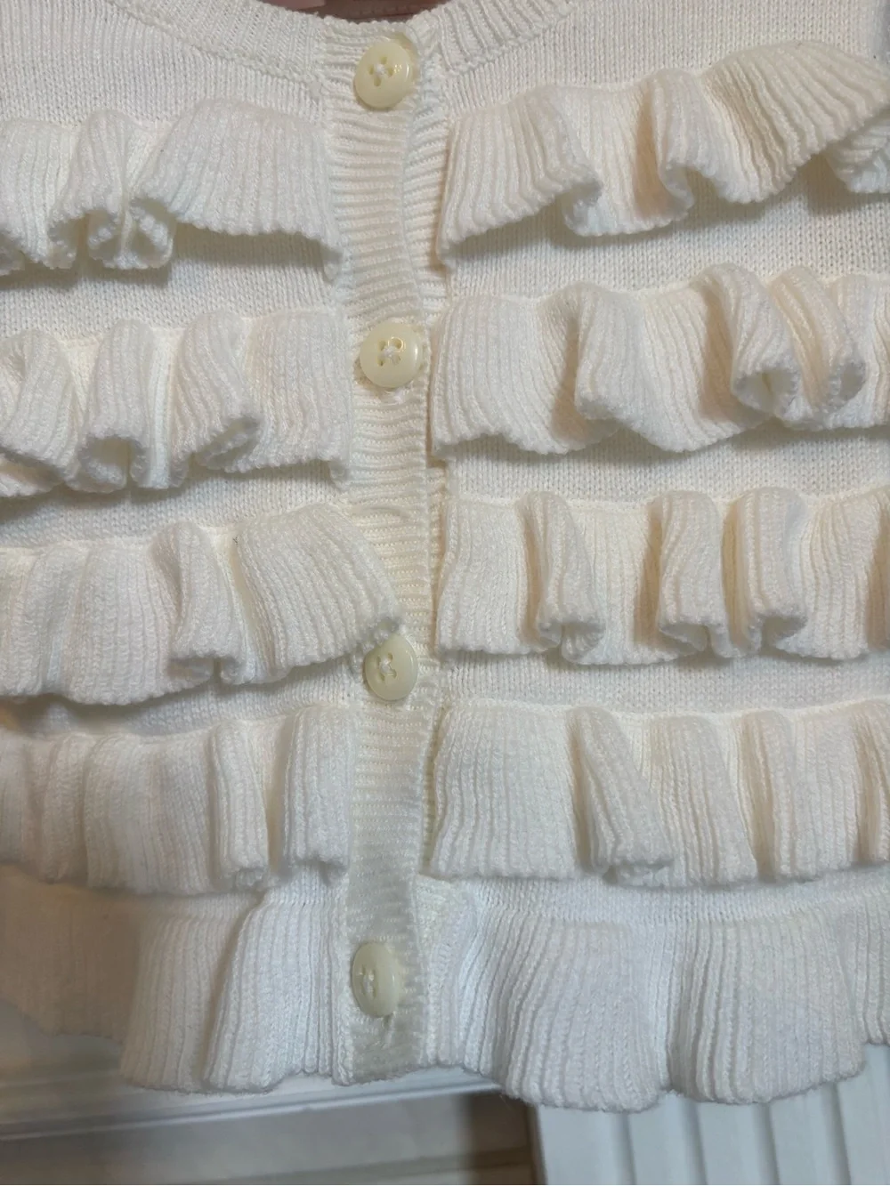 OshKosh B'gosh Ivory Knit Baby Cardigan with Ruffle Trim